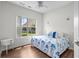 Serene bedroom with a cozy bed, window view, and a tranquil atmosphere for restful nights at 4648 Lightkeepers Way # 39A, Little River, SC 29566