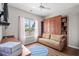 Comfortable bedroom with built-in shelves, offering ample storage and living space at 4648 Lightkeepers Way # 39A, Little River, SC 29566