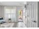 Bright foyer features tile flooring, soft neutral paint, and natural light at 4648 Lightkeepers Way # 39A, Little River, SC 29566