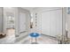 Hallway with tile flooring, closet and coastal-themed decor for a beachy vibe at 4648 Lightkeepers Way # 39A, Little River, SC 29566