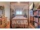 Charming bedroom featuring a canopy bed with floral bedding and a decorative lace canopy at 510 Fairwood Lakes Dr. # 15-I, Myrtle Beach, SC 29588