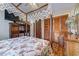 Inviting bedroom showcases a canopy bed, wood-look flooring, and a closet at 510 Fairwood Lakes Dr. # 15-I, Myrtle Beach, SC 29588