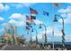 Scenic boardwalk view featuring colorful flags, a ferris wheel, and the Myrtle Beach skyline at 510 Fairwood Lakes Dr. # 15-I, Myrtle Beach, SC 29588