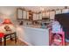 Functional kitchen with white cabinets, modern appliances, and a breakfast bar for casual dining at 510 Fairwood Lakes Dr. # 15-I, Myrtle Beach, SC 29588