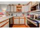 Well-equipped kitchen featuring updated appliances, generous counter space, and sleek cabinetry at 510 Fairwood Lakes Dr. # 15-I, Myrtle Beach, SC 29588