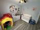 Light and airy bedroom with hard surface floors at 541 Irees Way, Longs, SC 29568