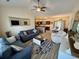 Open floor plan featuring a stylish living room, modern kitchen, and adjacent dining area at 541 Irees Way, Longs, SC 29568