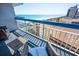 Relaxing balcony with comfortable seating and stunning beach views in the distance at 5511 Ocean Blvd. N # 805, Myrtle Beach, SC 29577