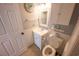 Bright bathroom with a white vanity, coordinated decor, and efficient use of space at 5511 Ocean Blvd. N # 805, Myrtle Beach, SC 29577