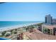 Expansive beach view from a balcony, featuring sandy shores and a beautiful ocean at 5511 Ocean Blvd. N # 805, Myrtle Beach, SC 29577