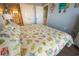 Comfortable bedroom with a queen-size bed and beach-themed decor at 5511 Ocean Blvd. N # 805, Myrtle Beach, SC 29577