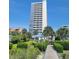 Exterior view of a high rise building with beach access and a gazebo at 5511 Ocean Blvd. N # 805, Myrtle Beach, SC 29577
