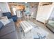 Cozy living room featuring an open floor plan to the kitchen and a comfortable seating area at 5511 Ocean Blvd. N # 805, Myrtle Beach, SC 29577