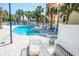 Attractive outdoor pool area featuring a curved pool and lounge chairs at 5511 Ocean Blvd. N # 805, Myrtle Beach, SC 29577