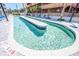 Modern pool design featuring a unique winding layout for swimming laps and relaxing at 5511 Ocean Blvd. N # 805, Myrtle Beach, SC 29577