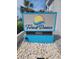 Forest Dunes building sign with a sun and ocean graphic at 5511 Ocean Blvd. N # 805, Myrtle Beach, SC 29577