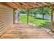 Covered back deck offering views of the expansive, fenced backyard at 553 Fox Chase Dr., Conway, SC 29527