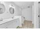 Bathroom featuring a double vanity, tile floors, and a step-up soaking tub at 553 Fox Chase Dr., Conway, SC 29527
