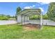 Spacious metal carport in backyard, ideal for vehicle or equipment storage with easy yard access at 553 Fox Chase Dr., Conway, SC 29527