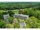 Aerial view of condos in a wooded location near a lush golf course at 562 Blue Stem Dr. # 54-F, Pawleys Island, SC 29585