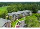 Beautiful aerial view of condo complex surrounded by lush, green trees at 562 Blue Stem Dr. # 54-F, Pawleys Island, SC 29585
