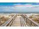 Beautiful wooden walkway to the beach with ocean views at 562 Blue Stem Dr. # 54-F, Pawleys Island, SC 29585