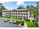 Well-kept condominium building with ample parking and landscaped grounds at 562 Blue Stem Dr. # 54-F, Pawleys Island, SC 29585