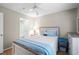 Main bedroom featuring a bed, dresser, and doorway to the main bathroom at 562 Blue Stem Dr. # 54-F, Pawleys Island, SC 29585