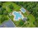 Aerial shot of neighborhood pool area with hot tub, lounge chairs, and cabana at 562 Blue Stem Dr. # 54-F, Pawleys Island, SC 29585