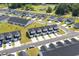 Aerial shot of a well-planned community with uniform homes and tree-lined streets at 563 Sea Sparrow St. # 563, Myrtle Beach, SC 29588