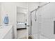 Clean bathroom with a glass-enclosed shower and view into the bedroom, providing a serene atmosphere at 563 Sea Sparrow St. # 563, Myrtle Beach, SC 29588