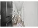 Inviting entryway featuring light wood floors, a console table with decor, and neutral paint at 563 Sea Sparrow St. # 563, Myrtle Beach, SC 29588