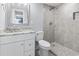 Bright bathroom features a vanity with stylish sink and walk-in shower with attractive grey tile at 601 Mitchell Dr. # 207, Myrtle Beach, SC 29577