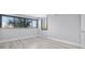 Bedroom features hardwood floors, large windows and neutral paint at 601 Mitchell Dr. # 207, Myrtle Beach, SC 29577