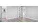 Bedroom featuring an ensuite bathroom, closet and neutral paint at 601 Mitchell Dr. # 207, Myrtle Beach, SC 29577
