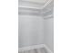 Walk-in closet featuring a wood clothes rod and white shelving at 601 Mitchell Dr. # 207, Myrtle Beach, SC 29577