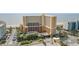 Beautiful exterior shot of a beachside resort featuring convenient parking and gorgeous landscaping at 6900 N Ocean Blvd. # 915, Myrtle Beach, SC 29572