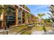 Exterior view of condos with picnic tables and grills in the courtyard at 6900 N Ocean Blvd. # 915, Myrtle Beach, SC 29572