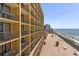 Exterior view from building balcony, overlooking beach and ocean view at 6900 N Ocean Blvd. # 915, Myrtle Beach, SC 29572