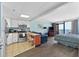 Combined living space featuring kitchen, bed, and ocean view balcony access at 6900 N Ocean Blvd. # 915, Myrtle Beach, SC 29572