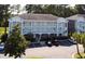 Exterior of a condominium community showcasing outdoor balconies at 698 Riverwalk Dr. # 304, Myrtle Beach, SC 29579