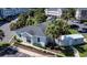 Charming single-story building with a gray roof, complemented by lush greenery and a brick walkway at 698 Riverwalk Dr. # 304, Myrtle Beach, SC 29579