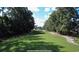Beautiful golf course view surrounded by mature trees and a clear blue sky perfect for a relaxing day on the green at 698 Riverwalk Dr. # 304, Myrtle Beach, SC 29579