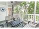 Relaxing screened porch with comfortable seating overlooking lush greenery at 698 Riverwalk Dr. # 304, Myrtle Beach, SC 29579
