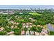 Aerial view highlighting the community's beautiful homes, lush trees, and serene water features at 7545 Ventura Ct., Myrtle Beach, SC 29572