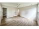 Light-filled bedroom with wood-look flooring and large closets at 7611 Coteswood Dr., Myrtle Beach, SC 29572