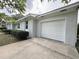 Attached one car garage with brick exterior and driveway at 7611 Coteswood Dr., Myrtle Beach, SC 29572