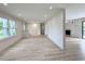 Spacious living area with ample natural light, wood-look flooring, and an open layout at 7611 Coteswood Dr., Myrtle Beach, SC 29572