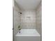 Shower featuring stylish vertical tile, bronze fixtures, and a built-in niche at 7611 Coteswood Dr., Myrtle Beach, SC 29572