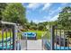 Charming backyard with lush landscaping and inviting patio furniture for outdoor relaxation and enjoyment at 816 Morrall Dr., North Myrtle Beach, SC 29582